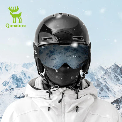 Person wearing a black helmet and goggles with a snowy mountain background, featuring the Qunature brand.