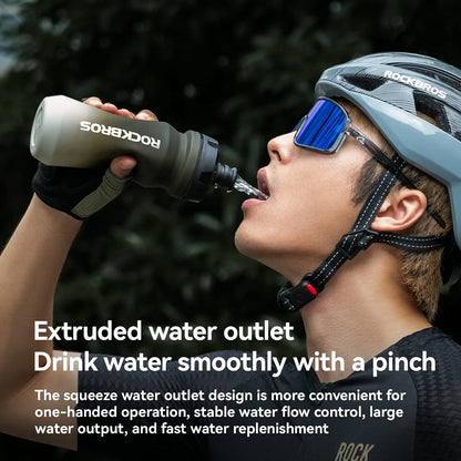 ROCKBROS lightweight bike bottle with pull-top lid, available in 600ml and 750ml sizes, designed for easy hydration during cycling. #Color_Gradient Gray White (600ml)
